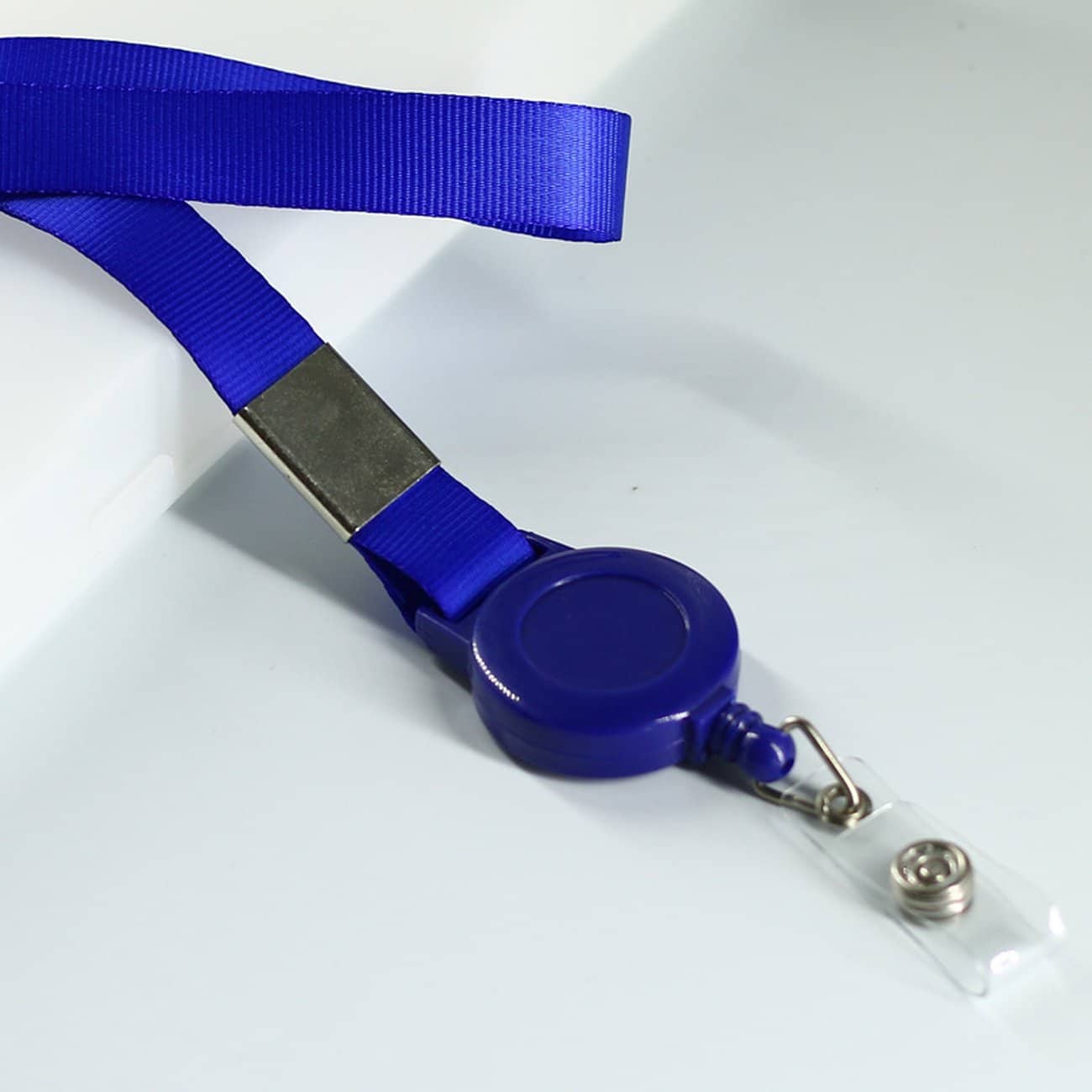 Ski pass tag with card case + blue lanyard